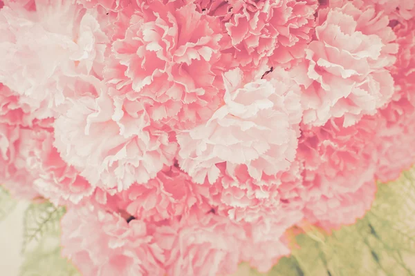 Blooming flower on wooden table. — Stock Photo, Image