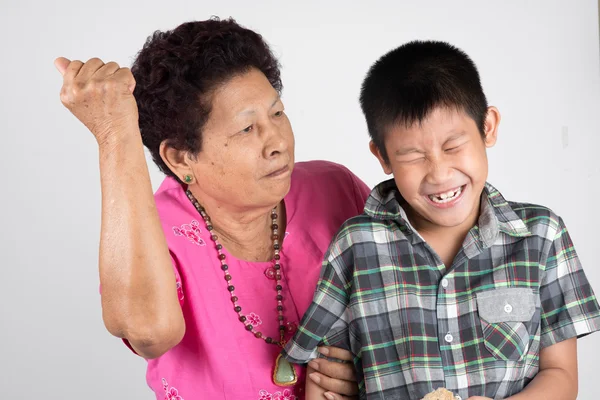 Grandmother scolds her grandson. — Stock Photo, Image