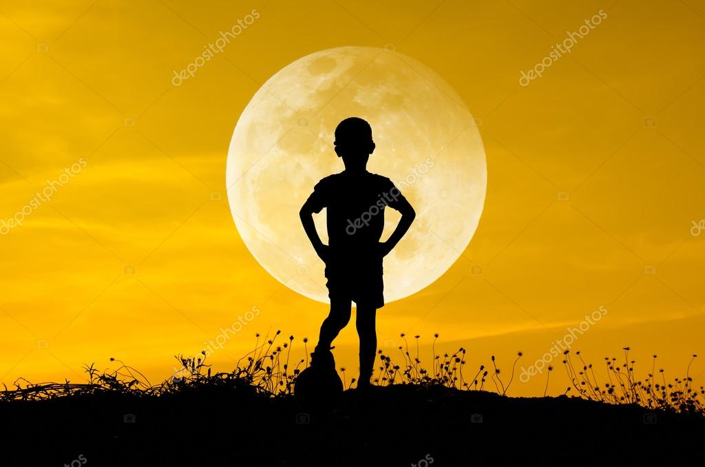 Boy With Soccer Ball Big Moon And Grass Silhouettes Background Stock Photo By C Jayjaynaenae