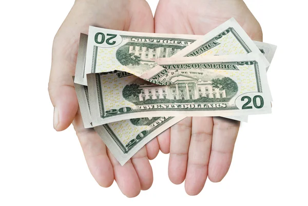 Birçok dolar kadın eli yırtılmış kağıt, para ile düşüyor. — Stok fotoğraf