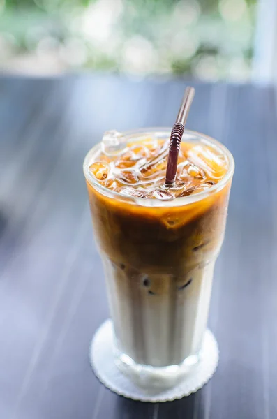 Iced coffee with brown straw and nature window light, dept of fi — Stock Photo, Image