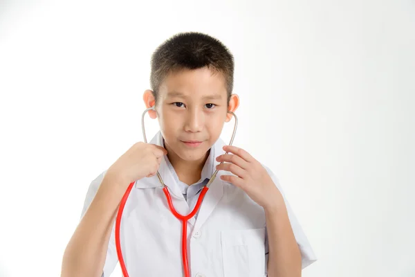 Niño vistiendo abrigo médico — Foto de Stock