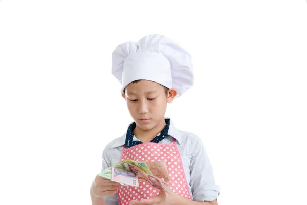 Молодой шеф-повар с деньгами — стоковое фото