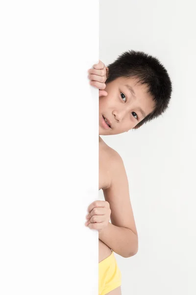 Asian boy holding whiteboard — Stock Photo, Image