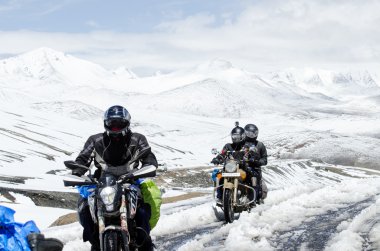 Bikers group at highest motorable Road. clipart