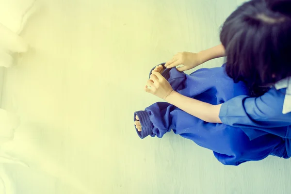 Girl sitting on floor — Stock Photo, Image