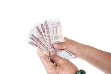yaşlı kadın holding para
