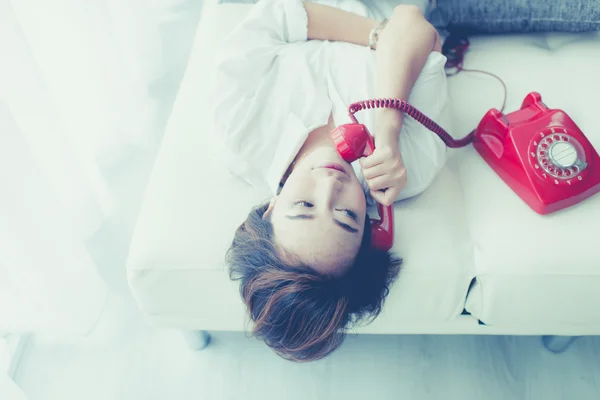 Woman talking on retro telephone — Stock Photo, Image