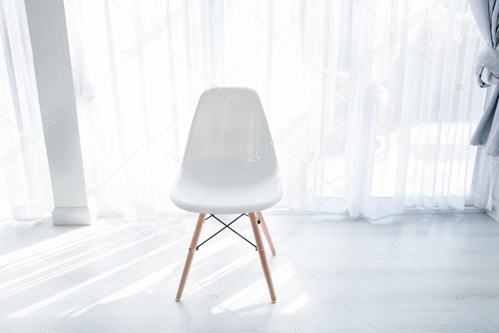 White Chair with white curtain