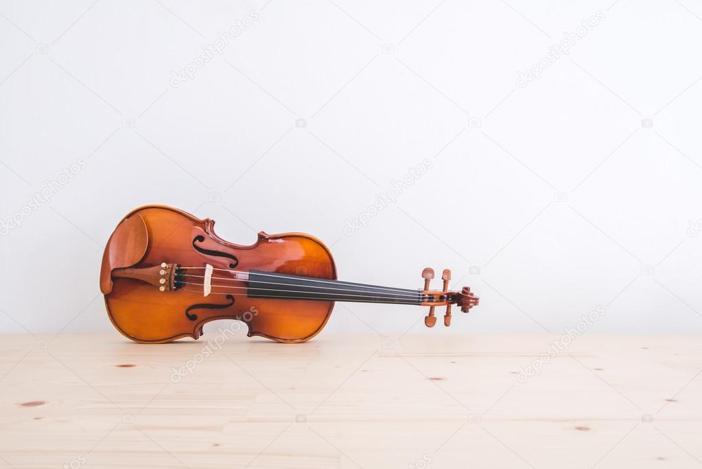 violin on wood table