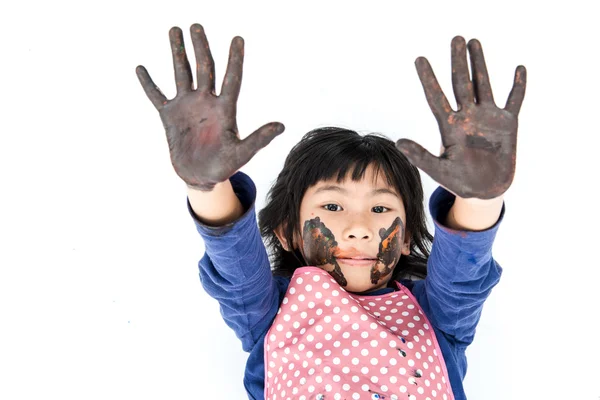 Funny little girl with dirty hands — Stock Photo, Image