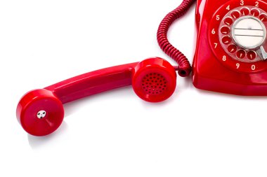 Eski ve beyaz üzerine kırmızı toz retro telefon.