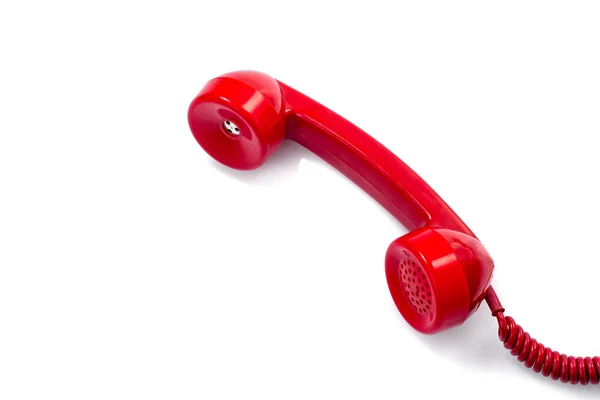 Velho e poeira telefone retro vermelho no branco . — Fotografia de Stock