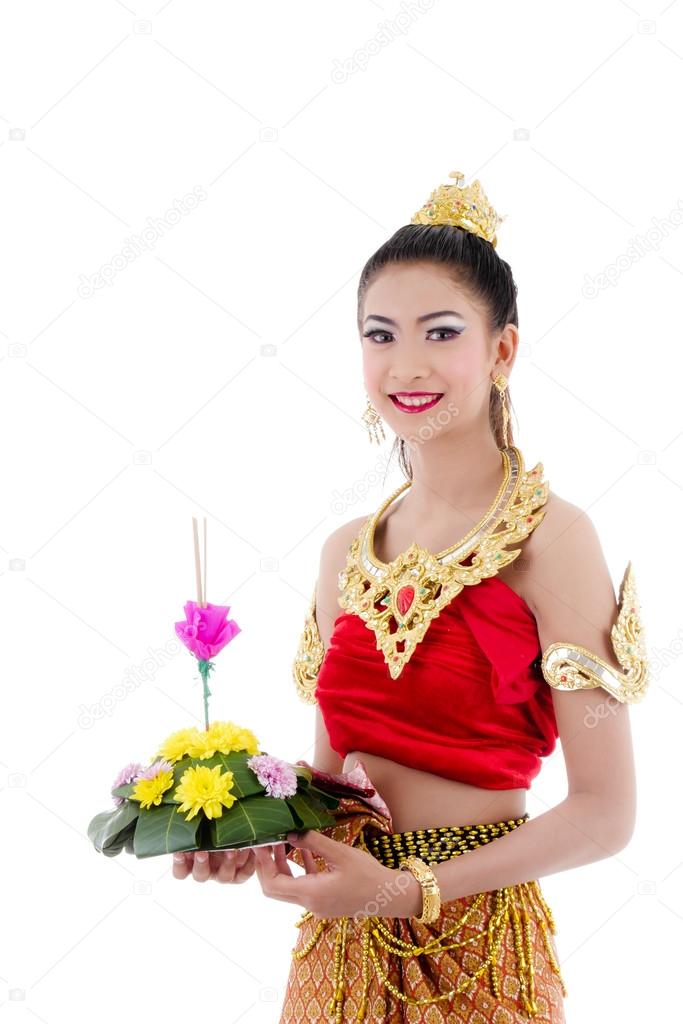 Thai Woman In Traditional Costume Of Thailand with Kratong on wh