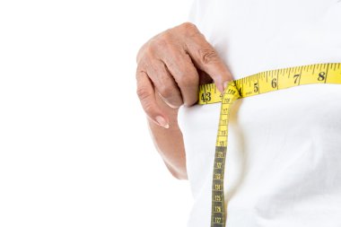 Üst düzey kadın beline beyaz ölçme.