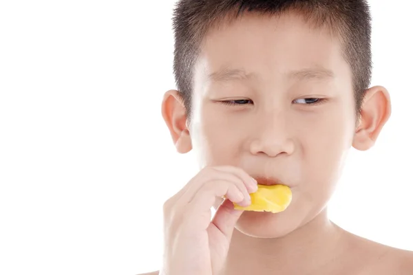 Boy eating jackfruit — Stock Photo, Image