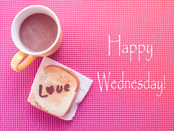 Love message on Bread sliced with and chocolate cup on pink yoga