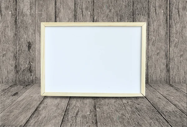 Empty whiteboard on Abstract wooden background — Stock Photo, Image