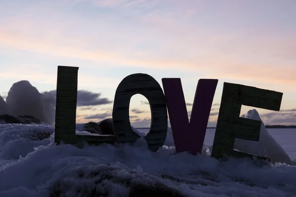 Winter sunrise with word love — Stock Photo, Image