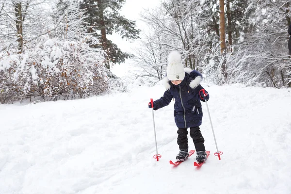 Children Feet Red Plastic Skis Sticks Snow Slide Winter Sport — Stock Photo, Image