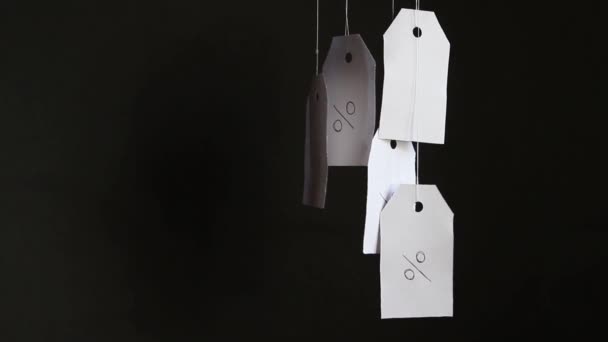 White Tags Percent Sign Hang Strings Black Background Shadows Commerce — Stock Video