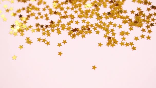 Golden Glittering Stars Shimmer Pink Background Sequin Pattern Festive Background — Stock Video