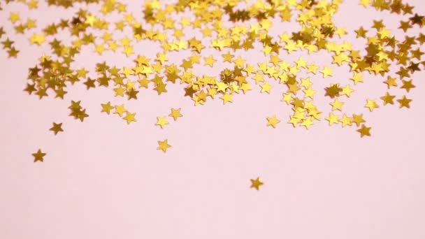 Golden Scintillanti Stelle Scintillano Uno Sfondo Rosa Modello Paillettes Sfondo — Video Stock