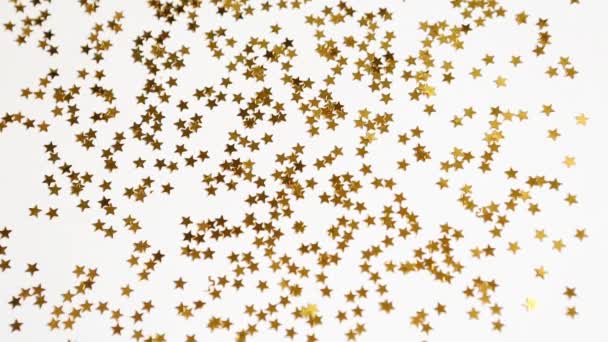 Des Étoiles Dorées Scintillantes Scintillent Sur Fond Blanc Modèle Paillettes — Video