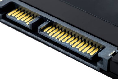 Macro shots of the SATA connector and the power connector on the solid-state drive.