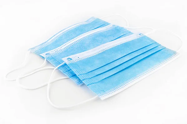 Three Blue Surgical Masks Personal Protection Virus Isolated White Background — Stock Photo, Image