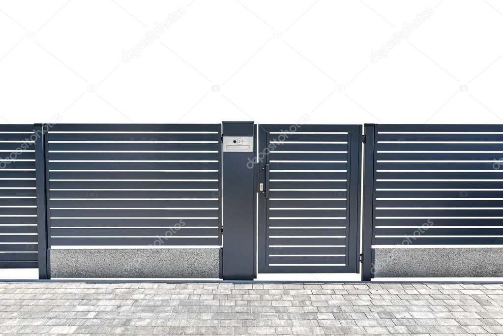 Modern panel fencing in anthacite color, visible wicket with videophone, isolated on white background with a clipping path, with space for text at the top.