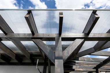 Construction of a terrace behind the house with various carpentry joints.