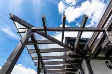 Construction of a terrace behind the house with various carpentry joints.