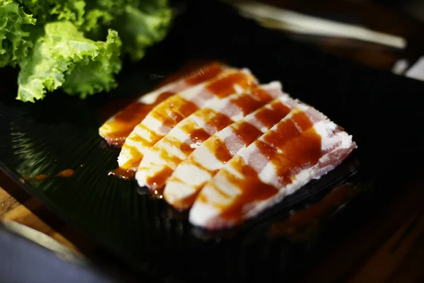 Rå nötkött segment för grillfest eller japansk stil yakiniku Stockbild