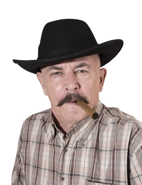 Cowboy med mustasch, i en svart hatt röka en cigarr — Stockfoto