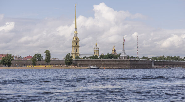View of the Peter and Paul fortress with a excursion boat, St.Petersburg