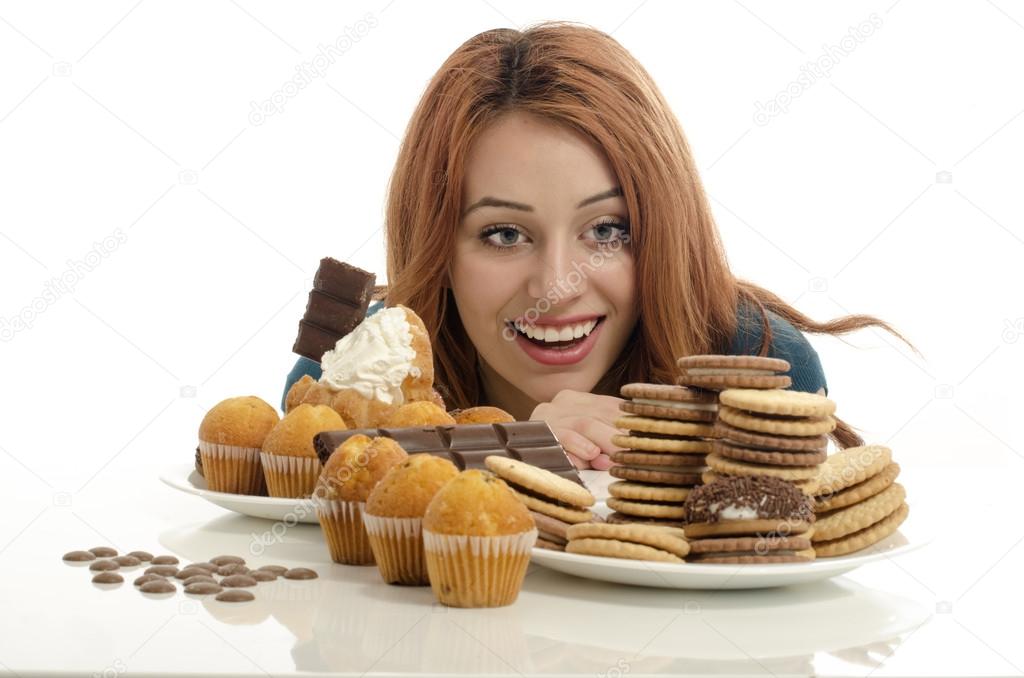 Woman in love with sweets, candies,chocolate and sugar