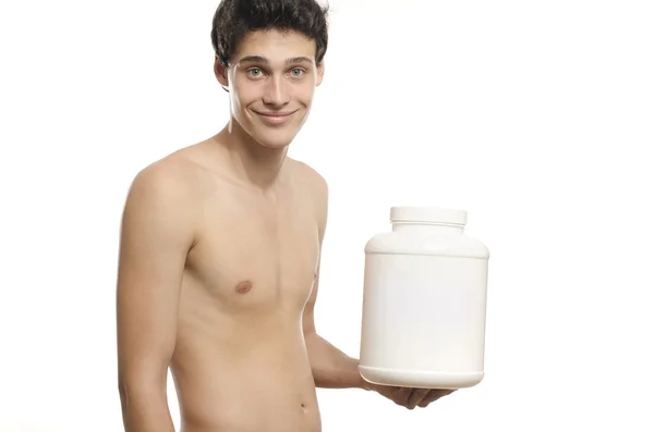 Skinny man training and drinking a protein shake. Anorexic young man training to become stronger and using steroids — Stock Photo, Image