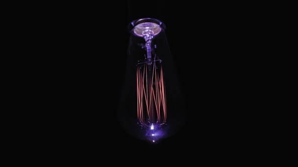 A lâmpada de filamento de tungstênio entra e desliga. — Vídeo de Stock