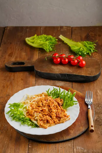 Plate Pasta Bolognese Sauce Nearby Fork Cherry Tomatoes Board Vertical — Stockfoto