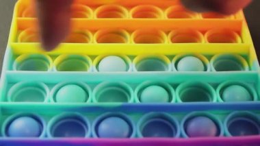 Oyuncak anti-stres parmaklar yuvarlak bastırın