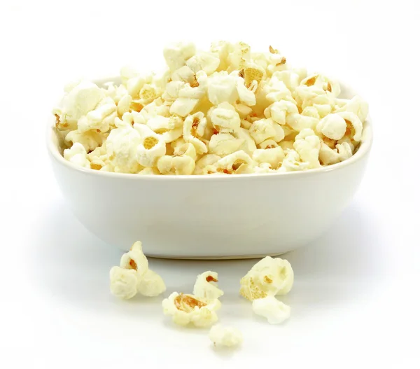Bowl of popcorn on white background — Stock Photo, Image