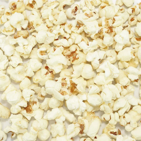 Popcorn on the white background — Stock Photo, Image