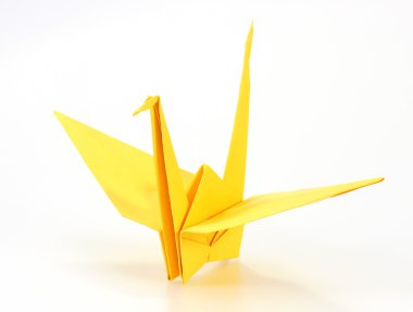 Geleneksel Japon origami turna sarı kağıttan WHI üzerinde yapılmış.