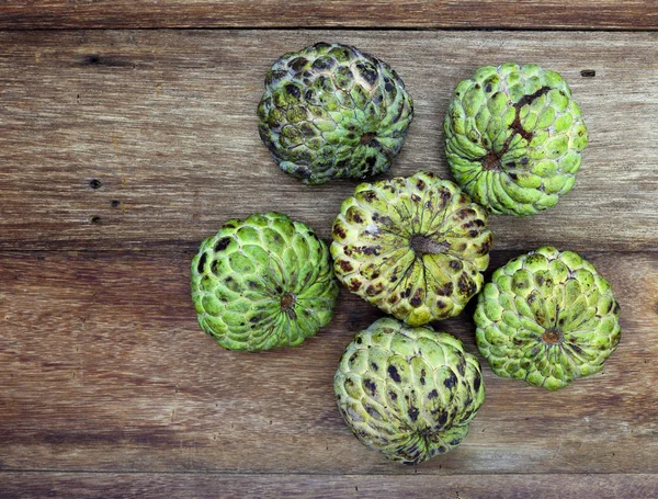 Custard apple fruit on the wood table — Stock Photo, Image