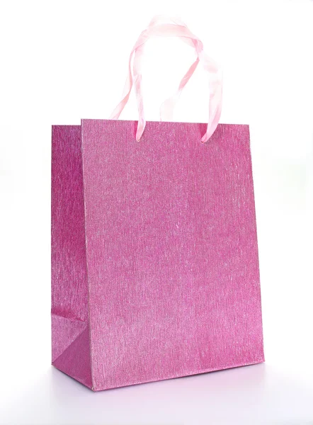 Saco de compras rosa isolado em um fundo branco — Fotografia de Stock