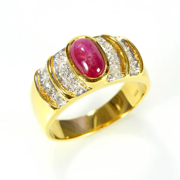 Gold ring with ruby and diamond on white background — Stock Photo, Image
