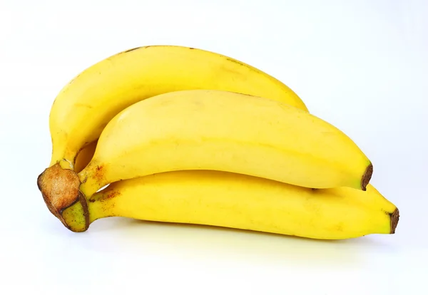 Куча бананов на белом фоне — стоковое фото