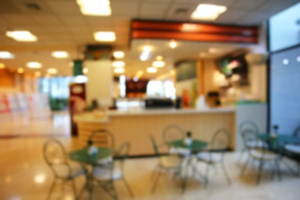 Coffee shop blur background with bokeh — Stock Photo, Image