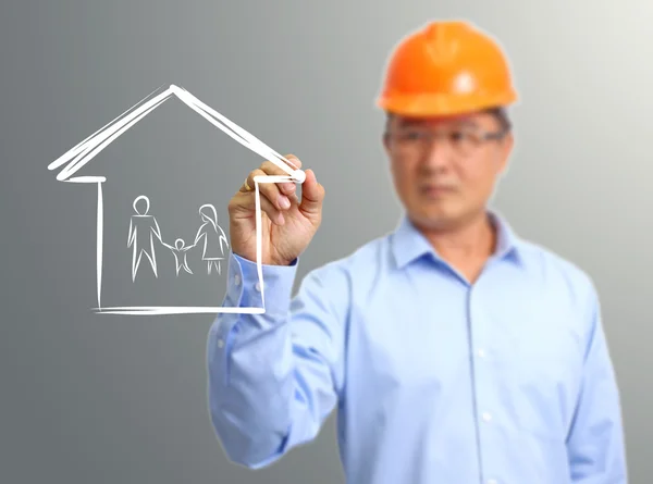 Engineer hand draw family in house on the virtual screen — Stock Photo, Image